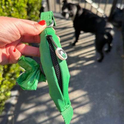 Green Woofa compostable poo bag in Ziippup built-in poo bag holder